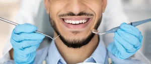periodontal-services-closeup-shot-of-smiling-man